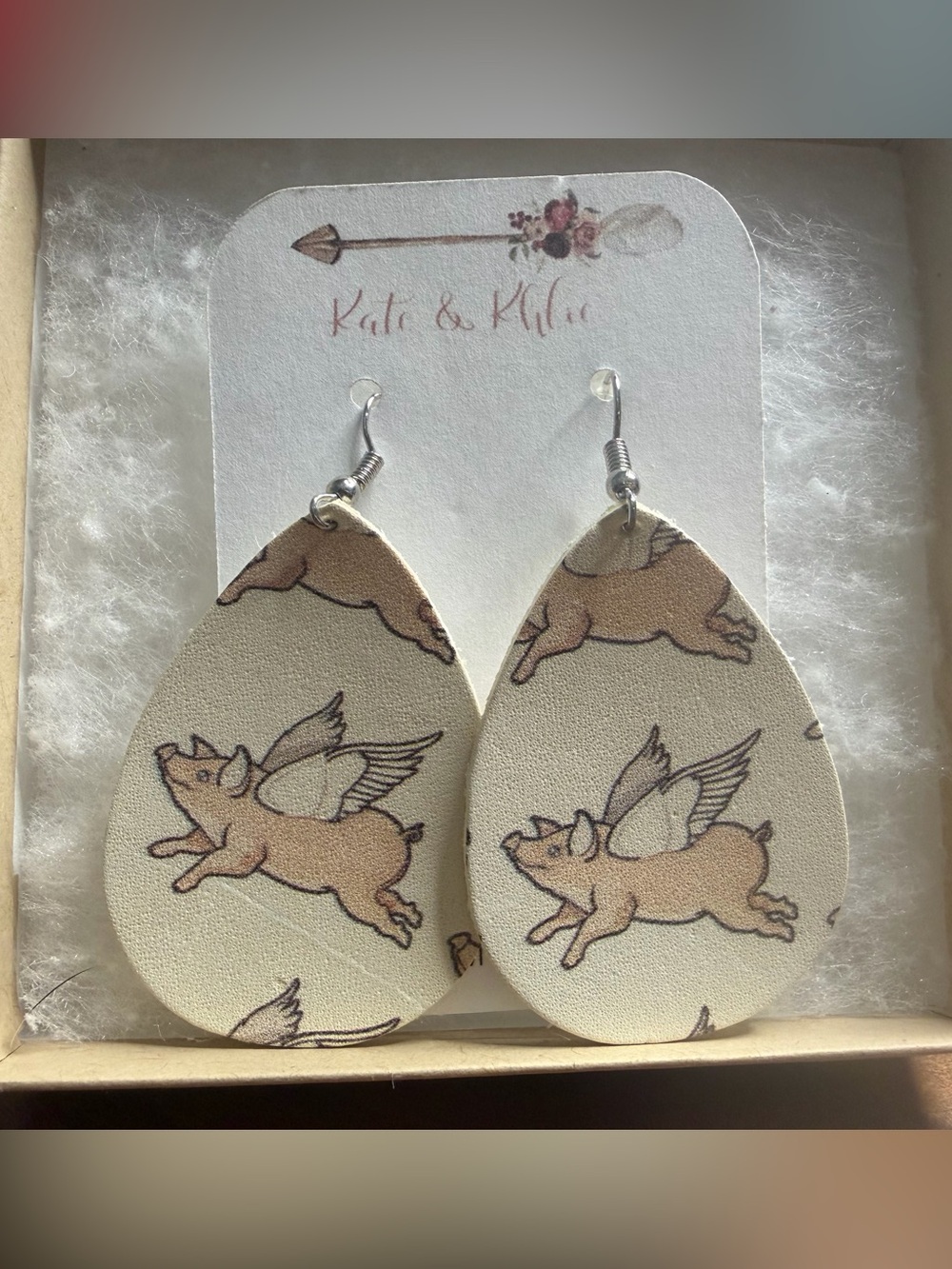 Beige Winged Pig Teardrop Earrings